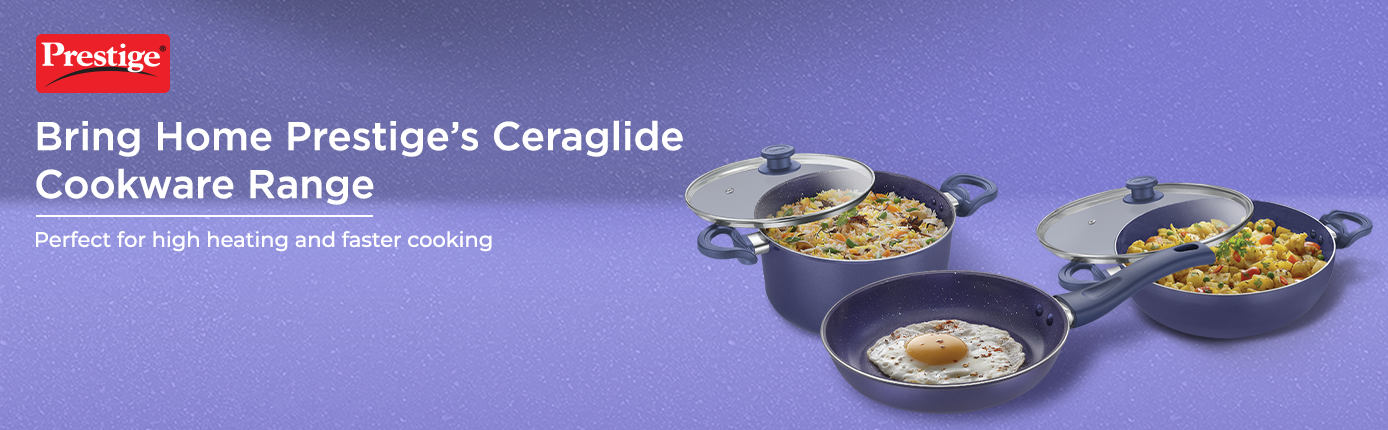 Ceramic Cookware Set Including Two Pots and a Frying Pan With Cooked Dishes