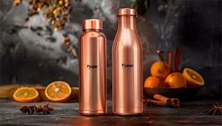 2 Prestige copper bottles